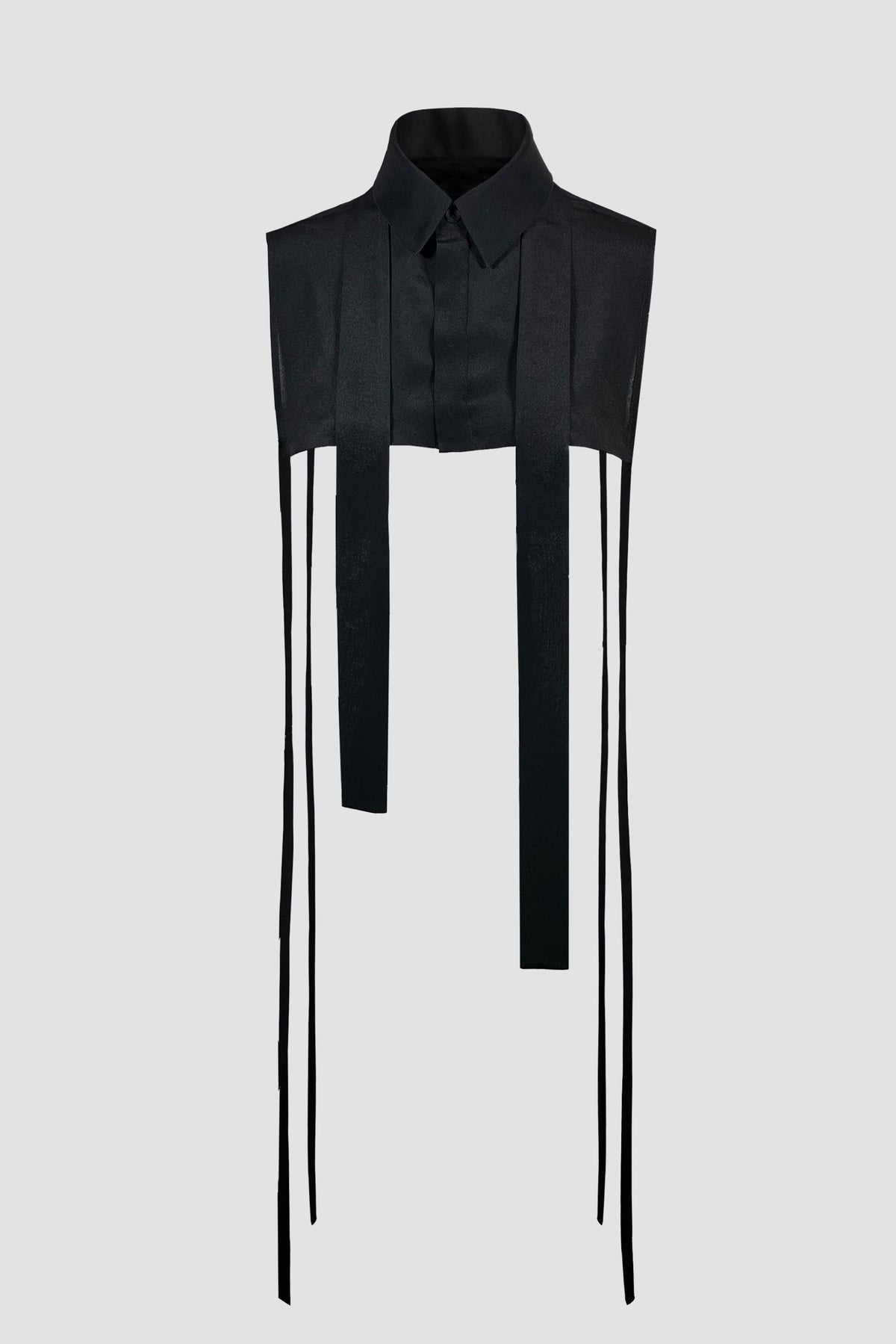 A black sleeveless collared shirt with long vertical white stripes running down the front and thin black tie-like straps hanging from the sides, shown on a light gray background.