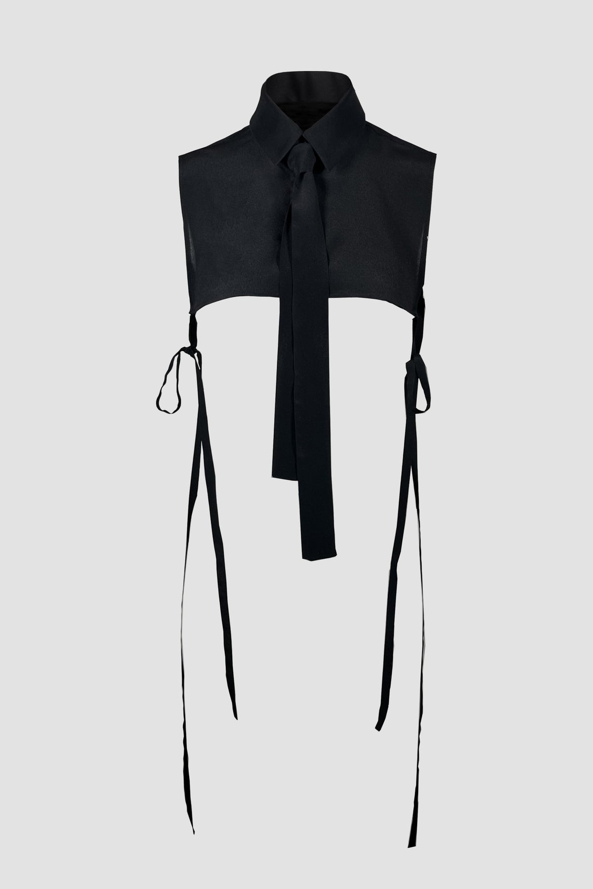 A black sleeveless collared top with a long tie-neck and long side ties, displayed on a light gray background.