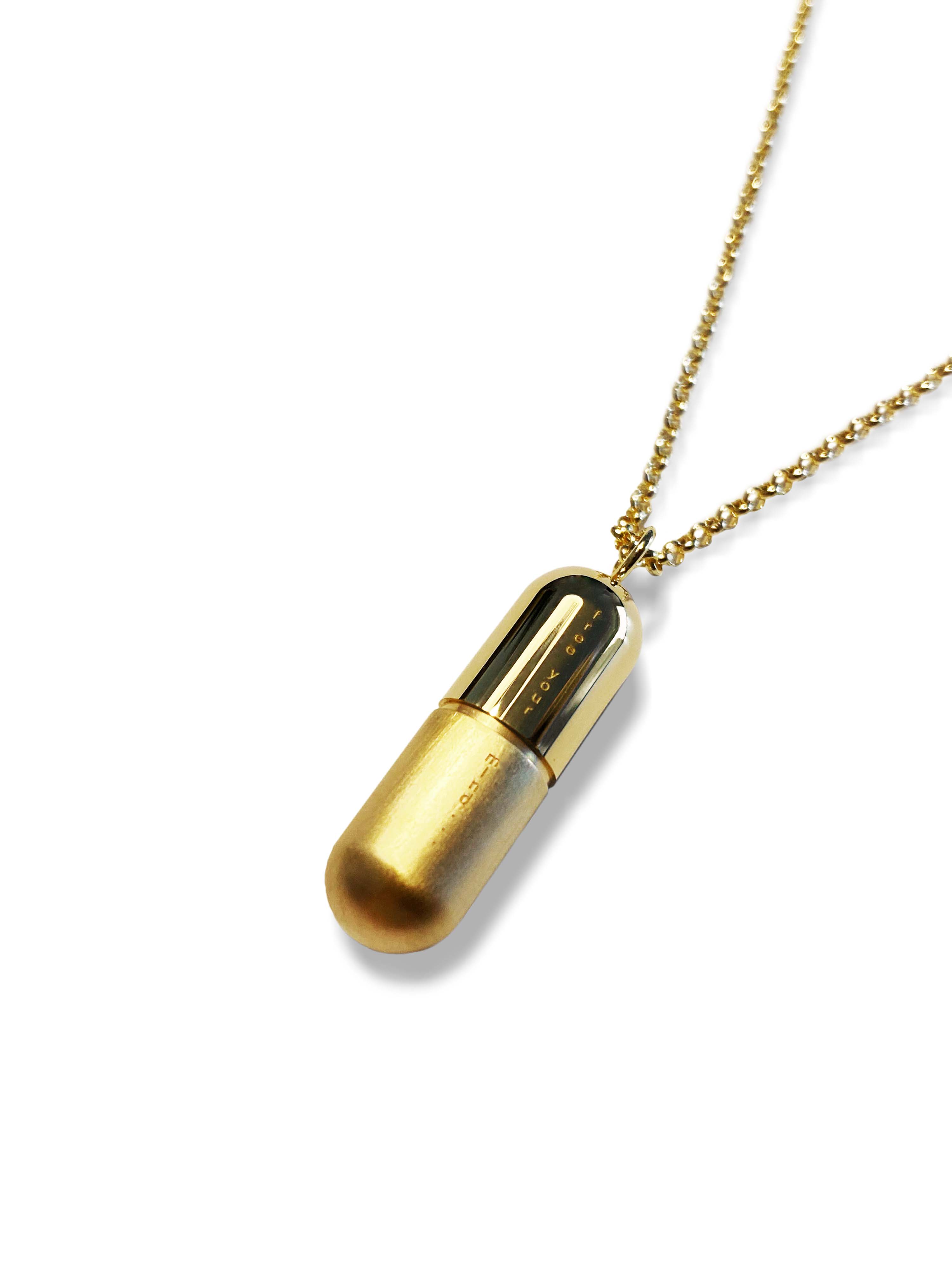 gold-pill with engraving