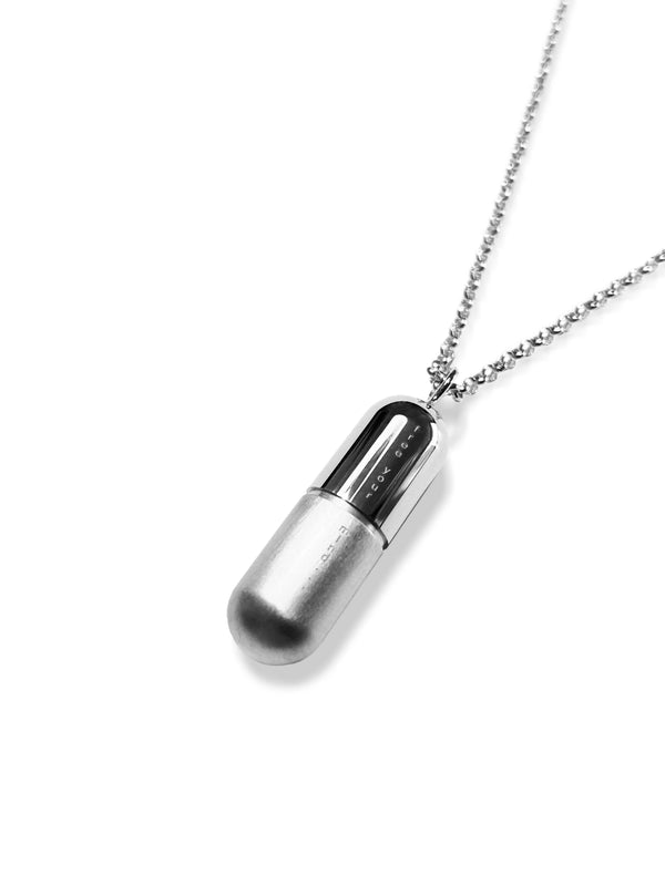 silver-pill with engraving